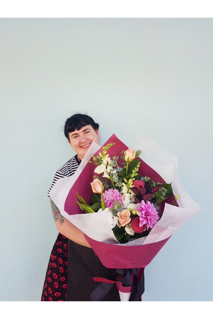 Sweetheart is A beautiful, seasonal mix with a few roses designed at our Kilbirnie Florist Shop