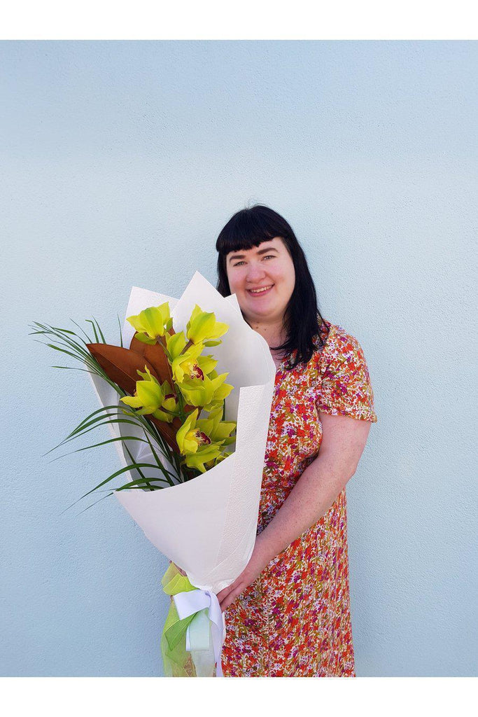 This single stem Orchid is beautifully wrapped, sent with a gift card containing your own personal message, and wet wrapped on the stems’ ends to ensure freshness.