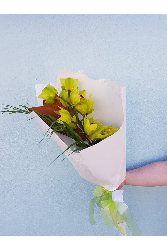 This single stem Orchid is beautifully wrapped, sent with a gift card containing your own personal message, and wet wrapped on the stems’ ends to ensure freshness.